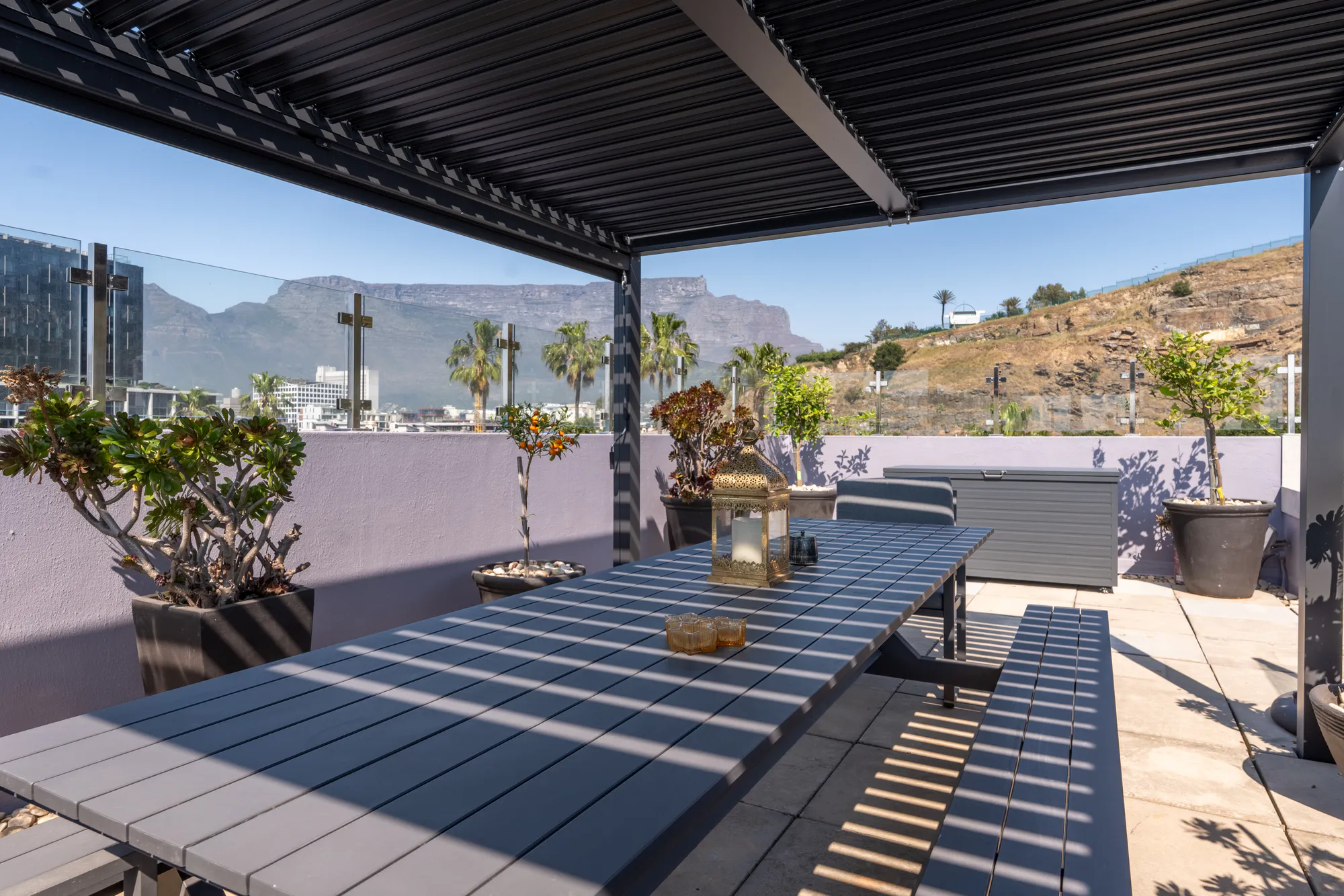 The rooftop dining table at Casa Dias with Table Mountain beyond